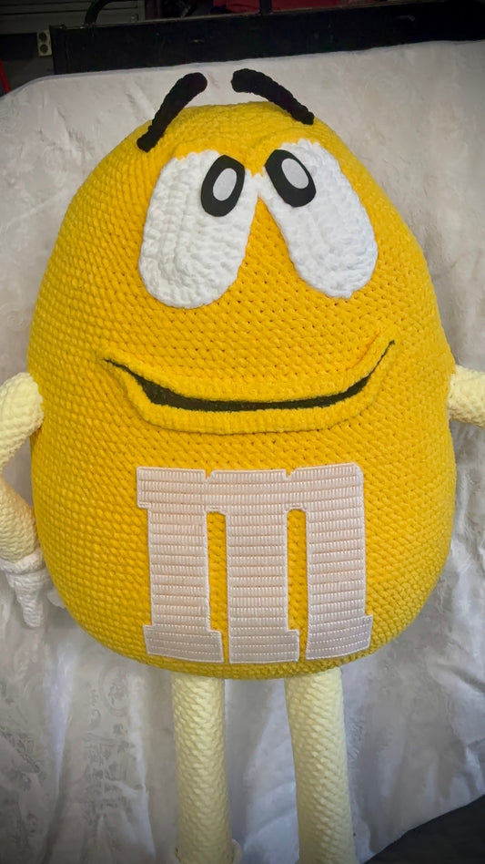 Yellow M&M standing character