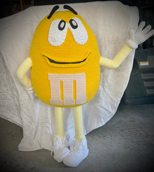 Yellow M&M standing character