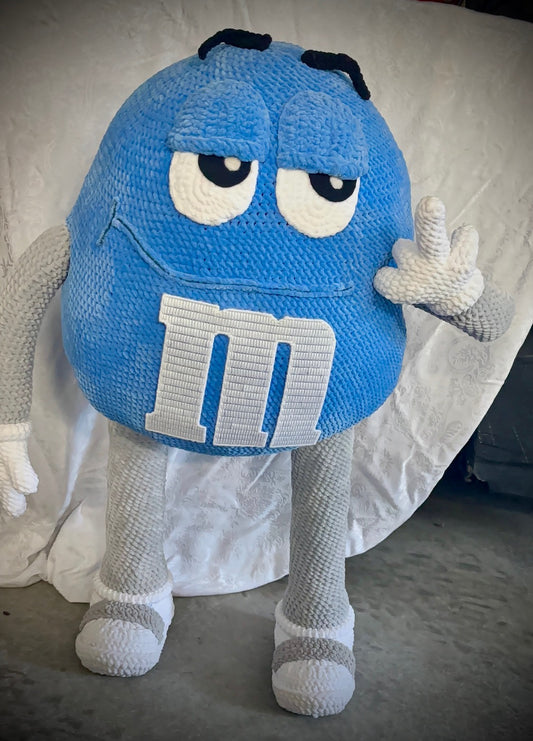 Blue M&M standing character