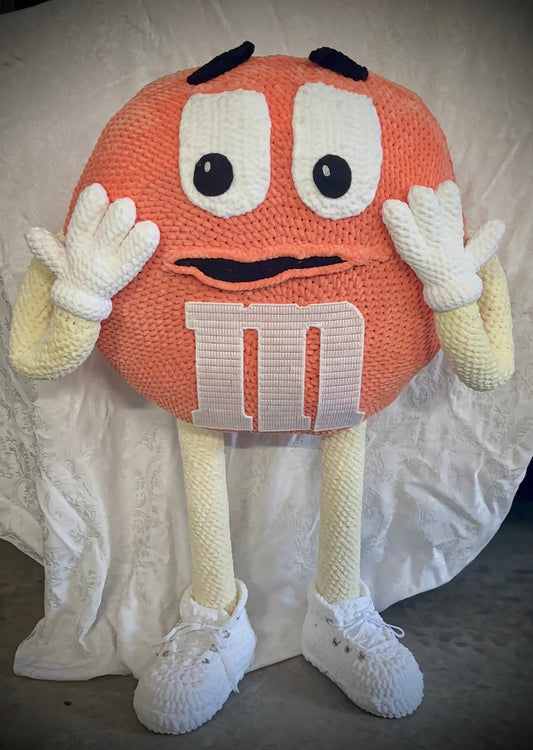 Orange M&M standing character